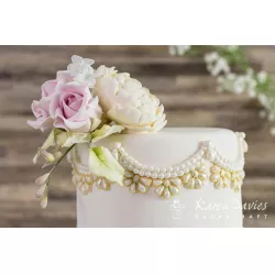 Szemcsés gyöngy formája foszilosított mintával