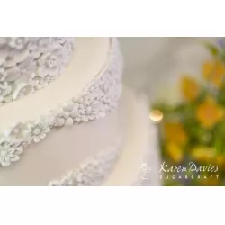 Szirom formája virágos tortadíszítő girlanda